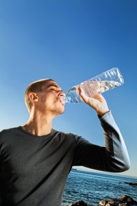 man drinking water